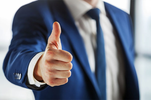 man giving a thumbs up gesture